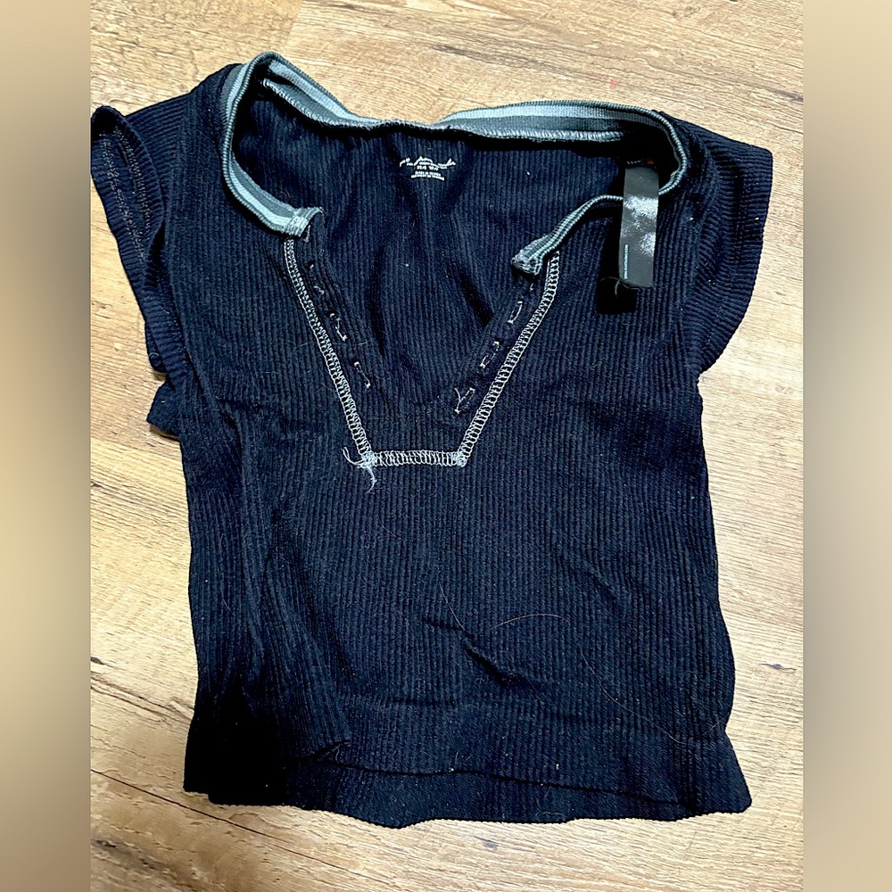 Urban outfitters, out from under.
xs black trendy top